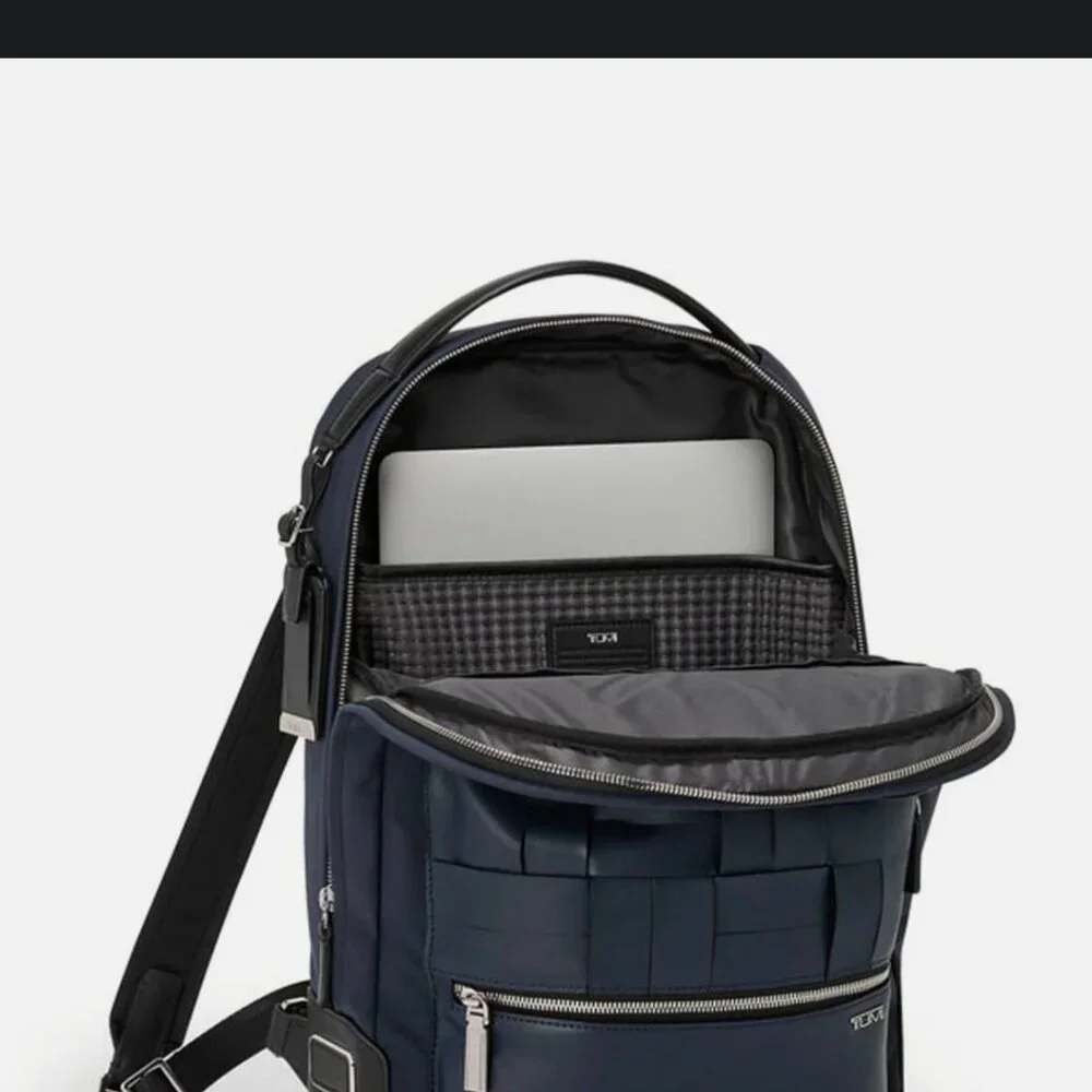Brand New!!!! This is a Tumi Harrison Bradner Backpack in navy blue
